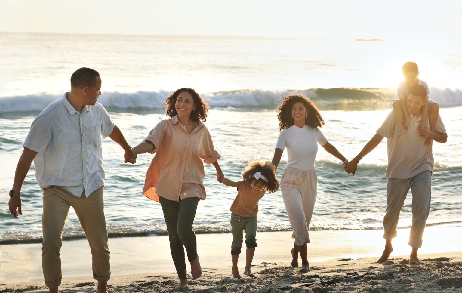 walking happy and big family holding hands at the beach for vacation trust and together in bali